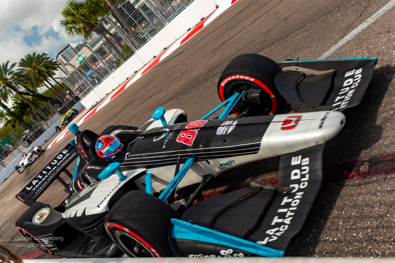 Colton Herta came out of Turn 10 at a bit too much of an angle but cut the wheel just in time to keep from having a tank-slapper against the wall. His rear tire brushed the wall ever so slightly with me right there. As i was taking this, I realized there might be wall contact and jumped back. I still got sand blasted.